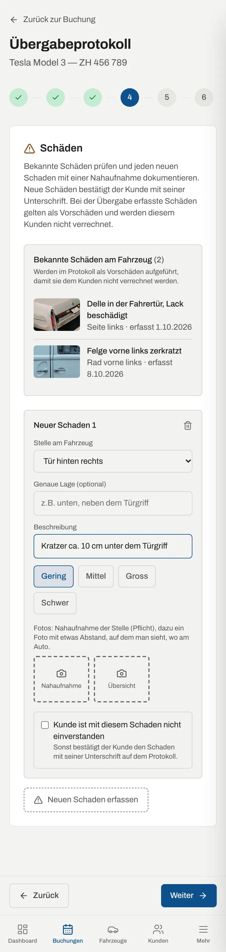 Neuer Schaden im Protokoll auf dem Handy, darüber die bekannten Schäden